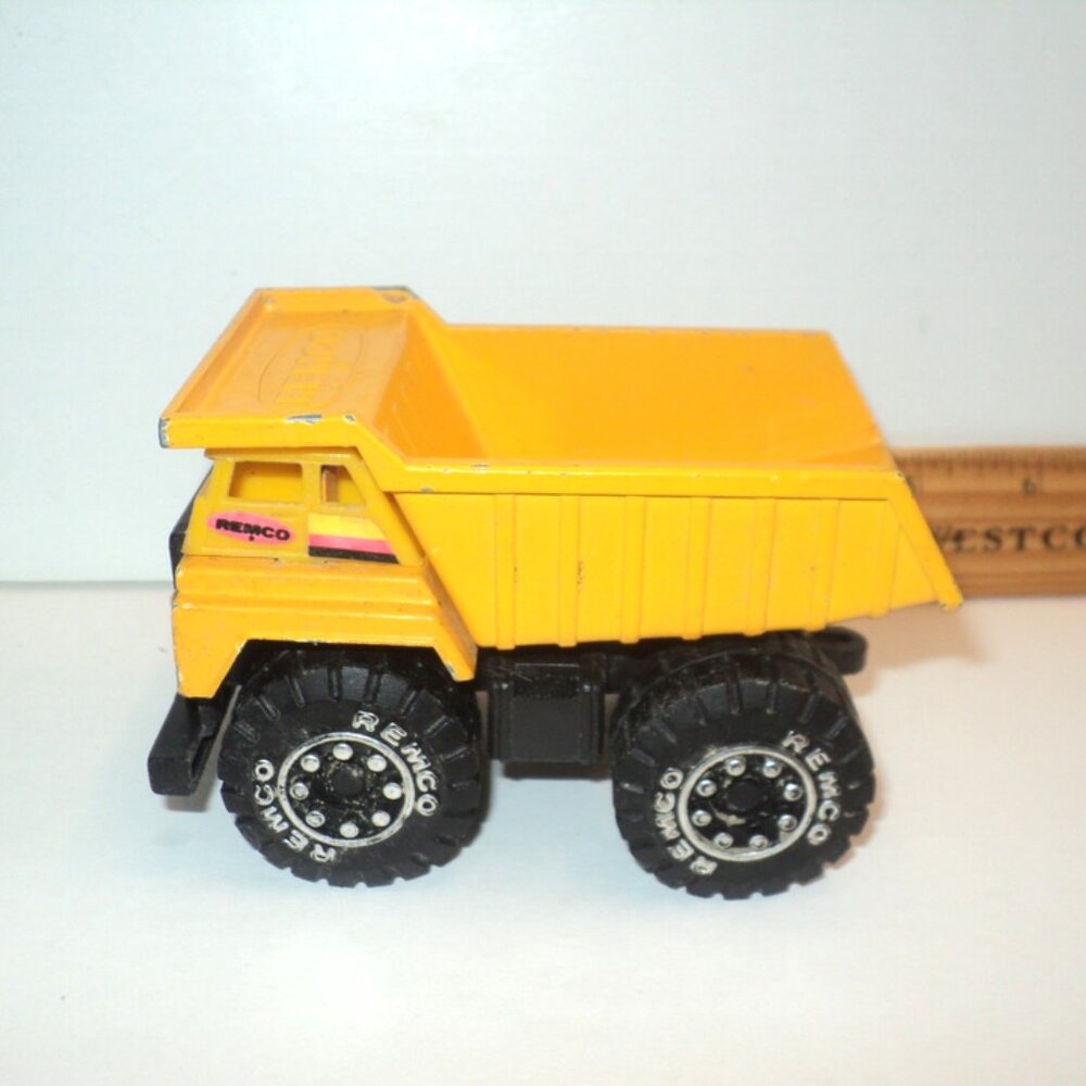 Remco Toy Dump Truck Vintage 1987 Yellow 4 1/2" Long 1:32 Scale Metal Toy
